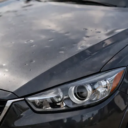 Vehicle before PDR repair — hail damage